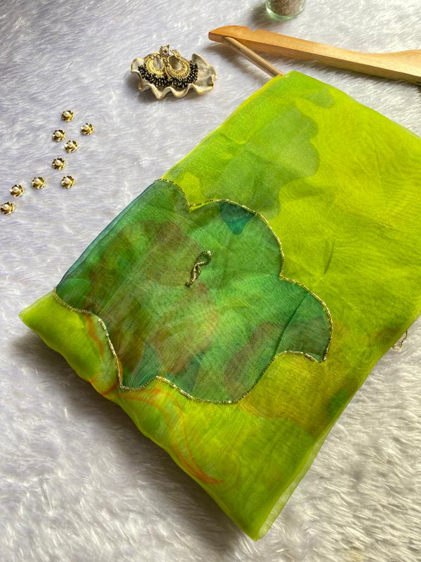 Green organza handwork sarees