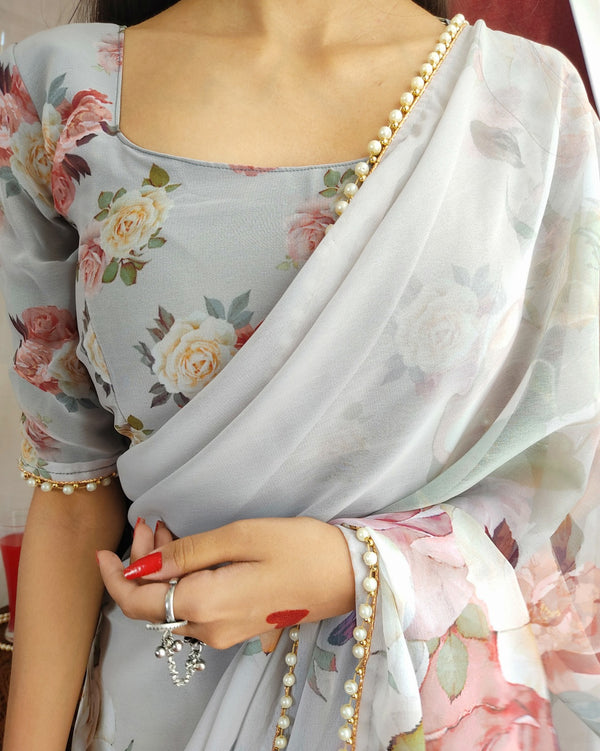 White georgette printed saree with Pearl lace border